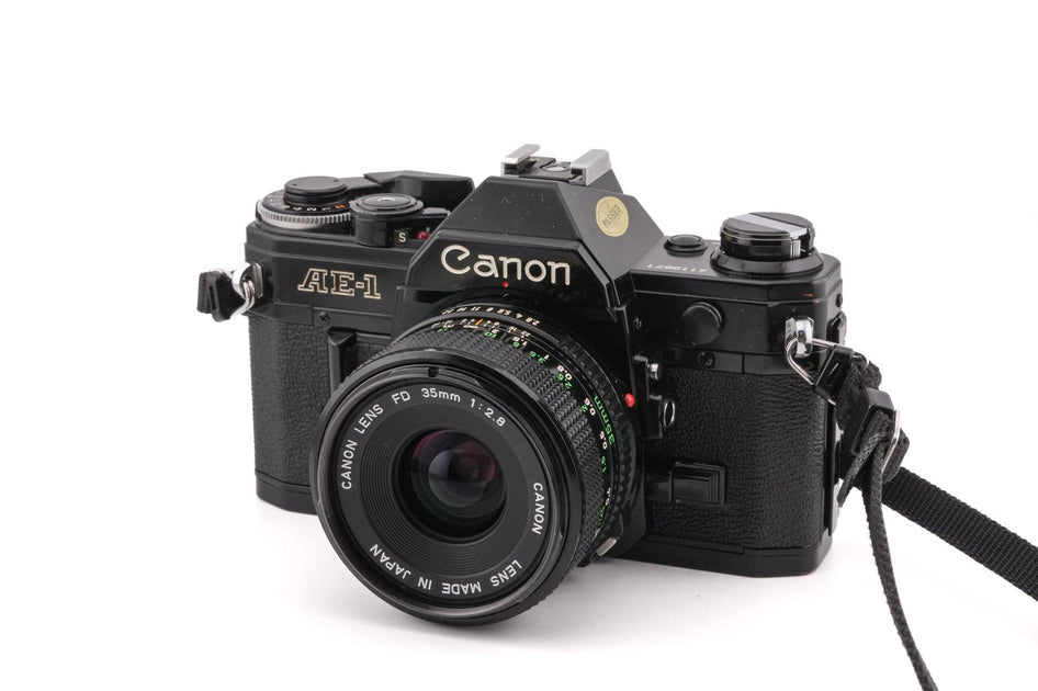 Canon AE-1 program 黒35mm f2.8レンズ付 Canon AE-1 + 35mm f2.8 FDn – Camera Market