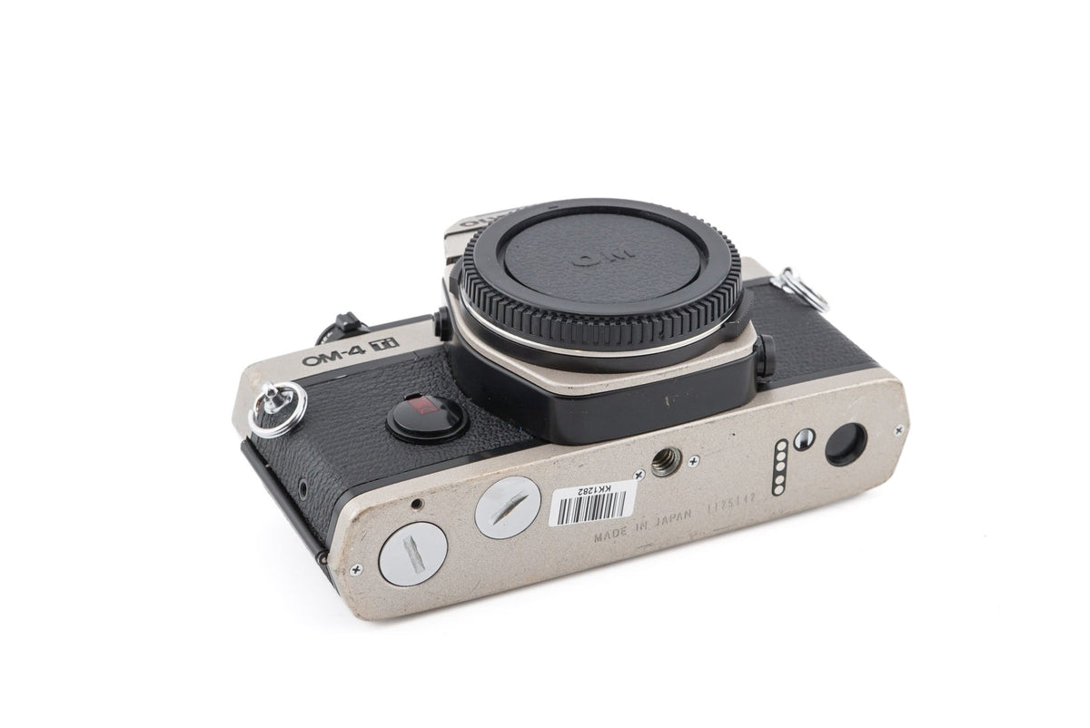 Discover the timeless beauty of the Olympus OM-4 Ti at Camerashop