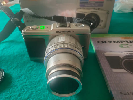 Olympus  Pen EP-12fd306b8-336a-4918-bf00-55052cbefef3