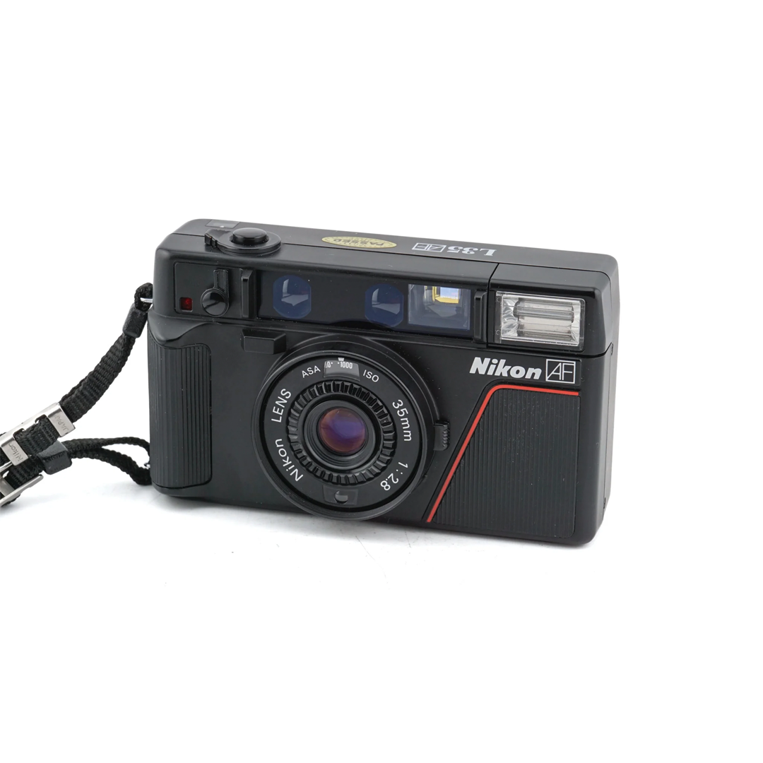 Discover the classic and compact Nikon L35AF at CameraShopBCN