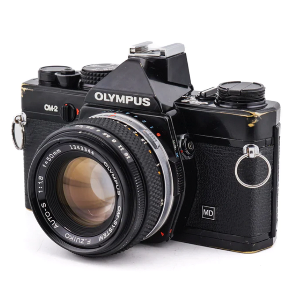 Olympus OM-2 + 50mm f1.8 F.Zuiko Auto-S - Vintage 35mm SLR Camera · hoofdafbeelding