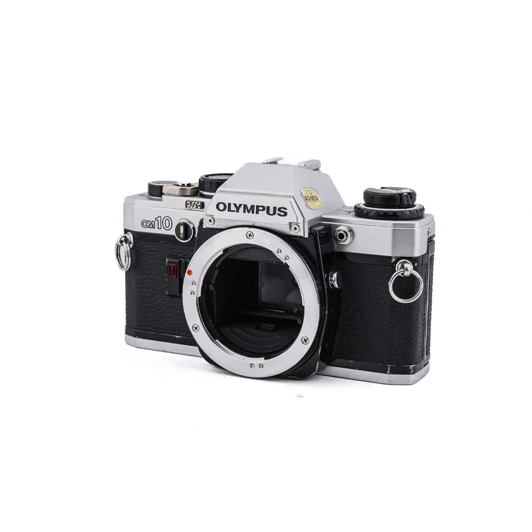 OLYMPUS OM-10 フィルム一眼レフカメラ Descubre el poder de la Olympus OM10 📸 | CameraShopBCN – Camera
